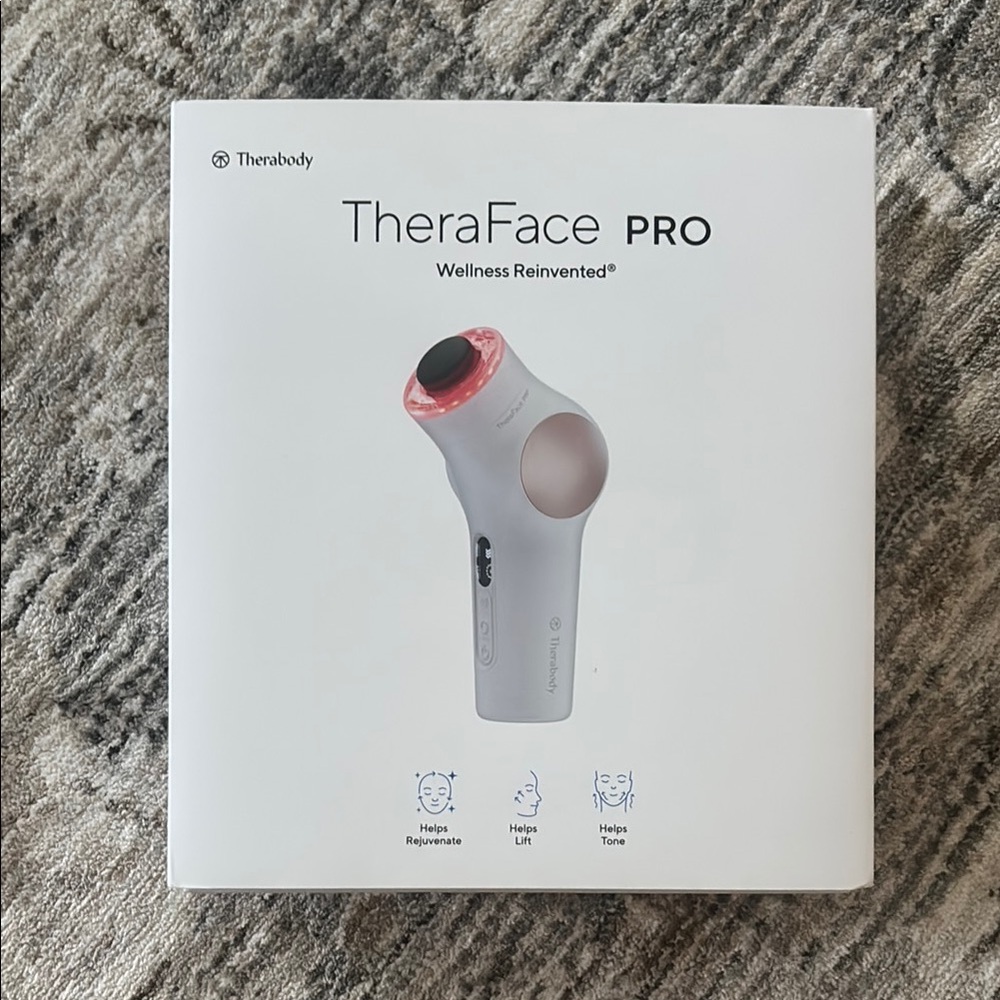 Therabody TheraFace PRO in Silver and Pink